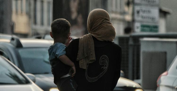 Mother holding son