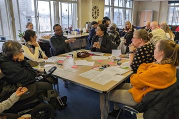 Participants at mental well being workshop during discussion.