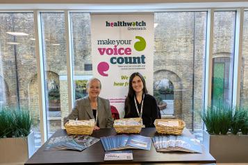 Healthwatch Greenwich volunteer and staff at the Gadget Show for the Forgetful in Woolwich.