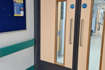 Ward 19 entrance door and welcome sign, Queen Elizabeth Hospital