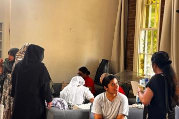 women talking to each other