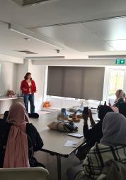 Healthwatch Greenwich representative delivering an "awareness of abuse" session with a local group supporting Muslim women.